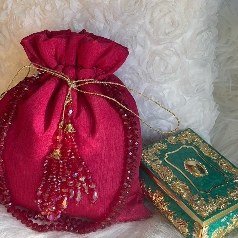 Raw Silk Potli Bags with Heavy Crystal Tassels