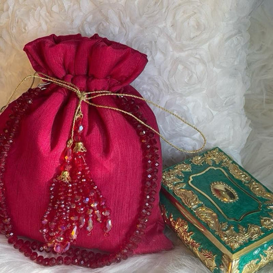 Raw Silk Potli Bags with Heavy Crystal Tassels