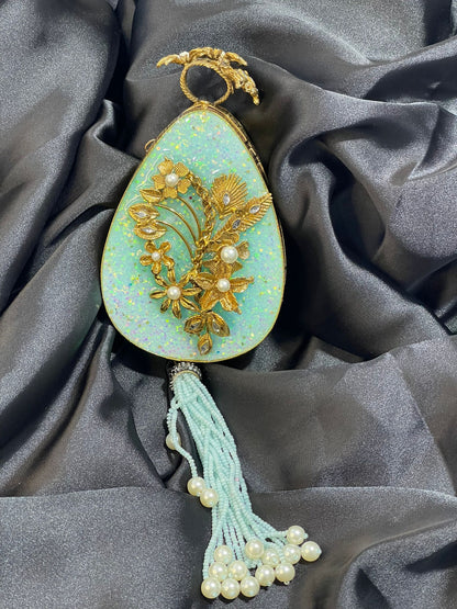 Oval Metal Craft Clutch in Aqua & Lavender – Handcrafted with Large Beaded Tassel