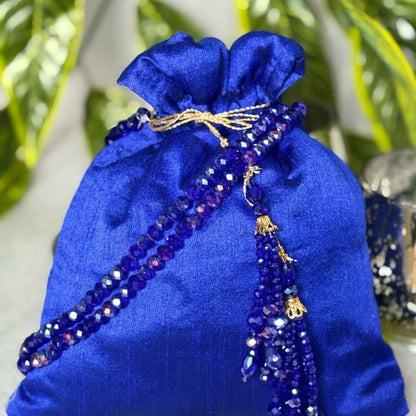 Raw Silk Potli Bags with Heavy Crystal Tassels